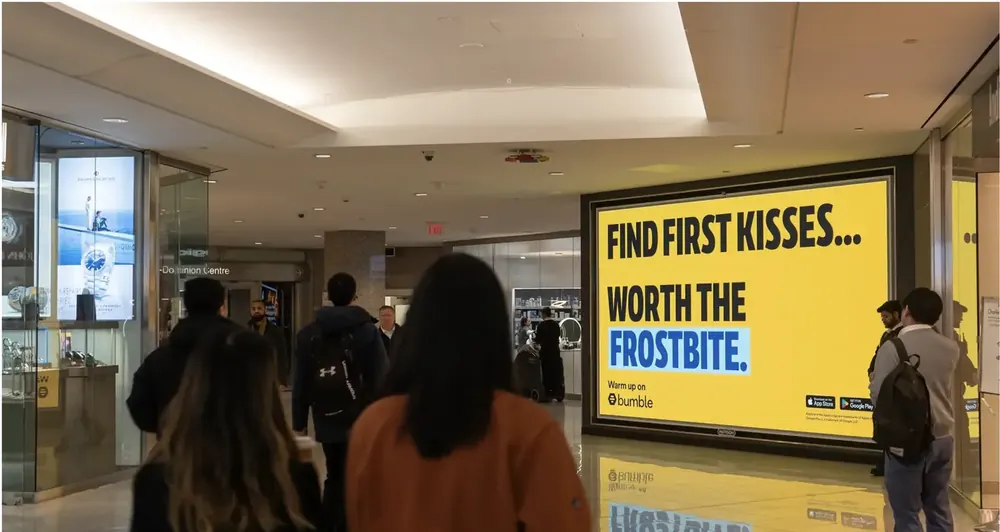 Pattison large-format digital screen in a Toronto PATH retail concourse