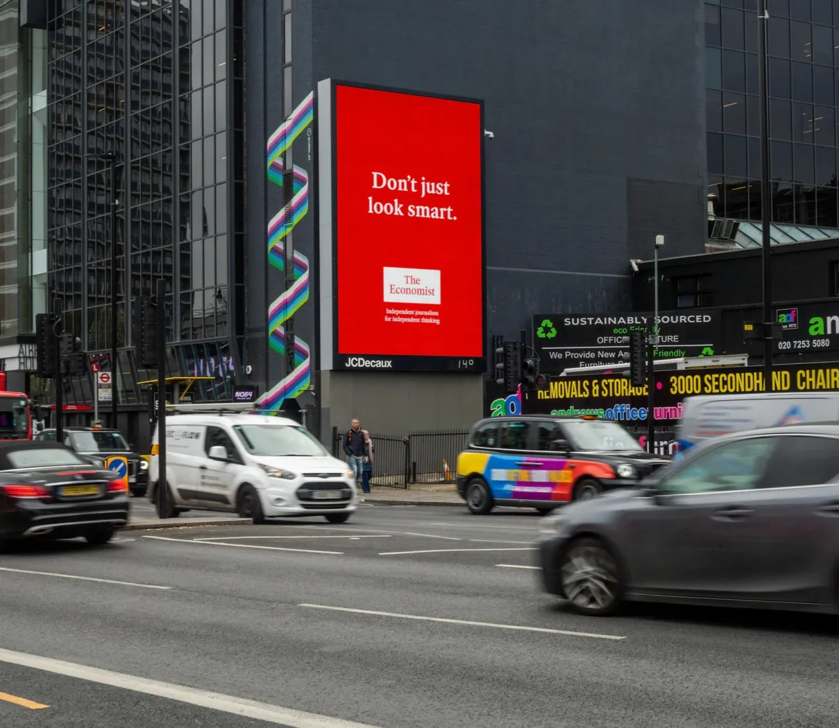 Digital 96-sheet screen at a city roadside junction