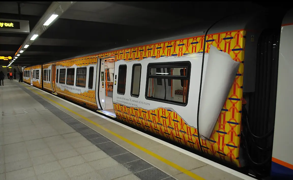 London train with a full exterior advertising wrap