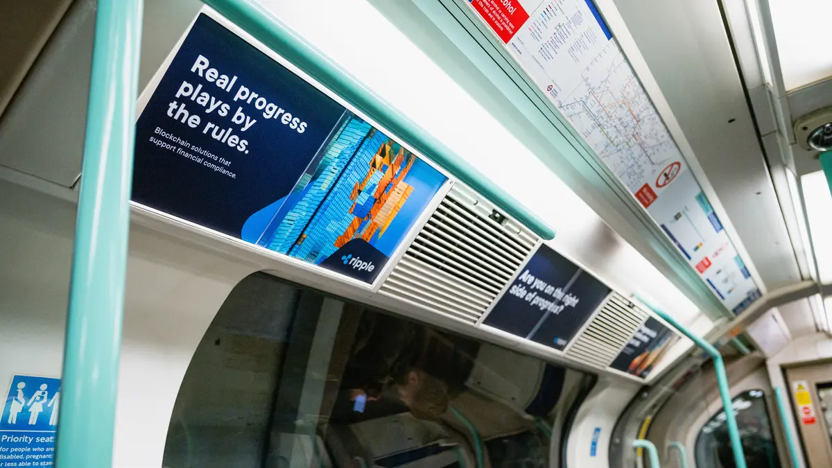 Advertising card panels inside a London Underground train carriage